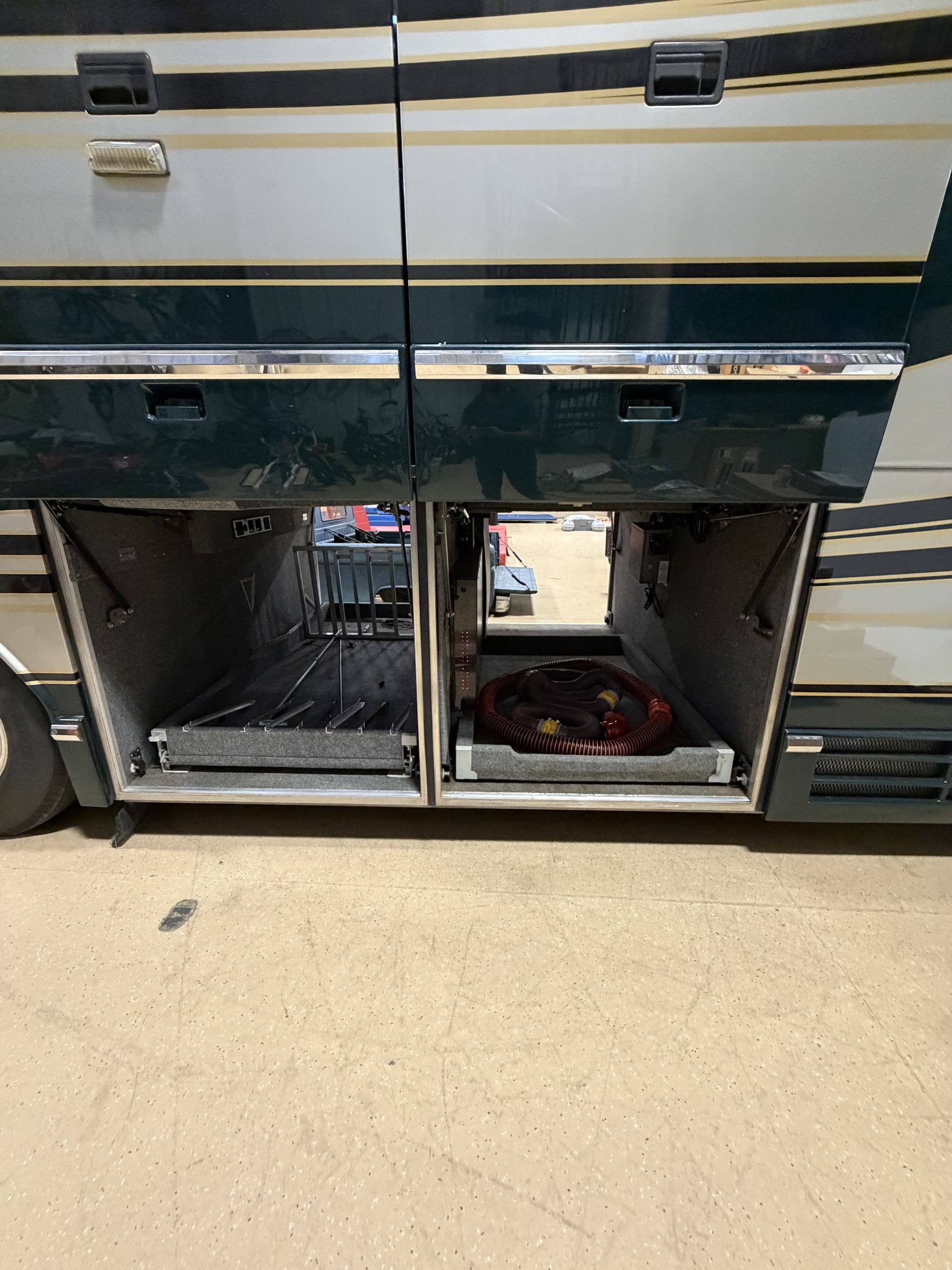 Twin open pass-through basement storage bays