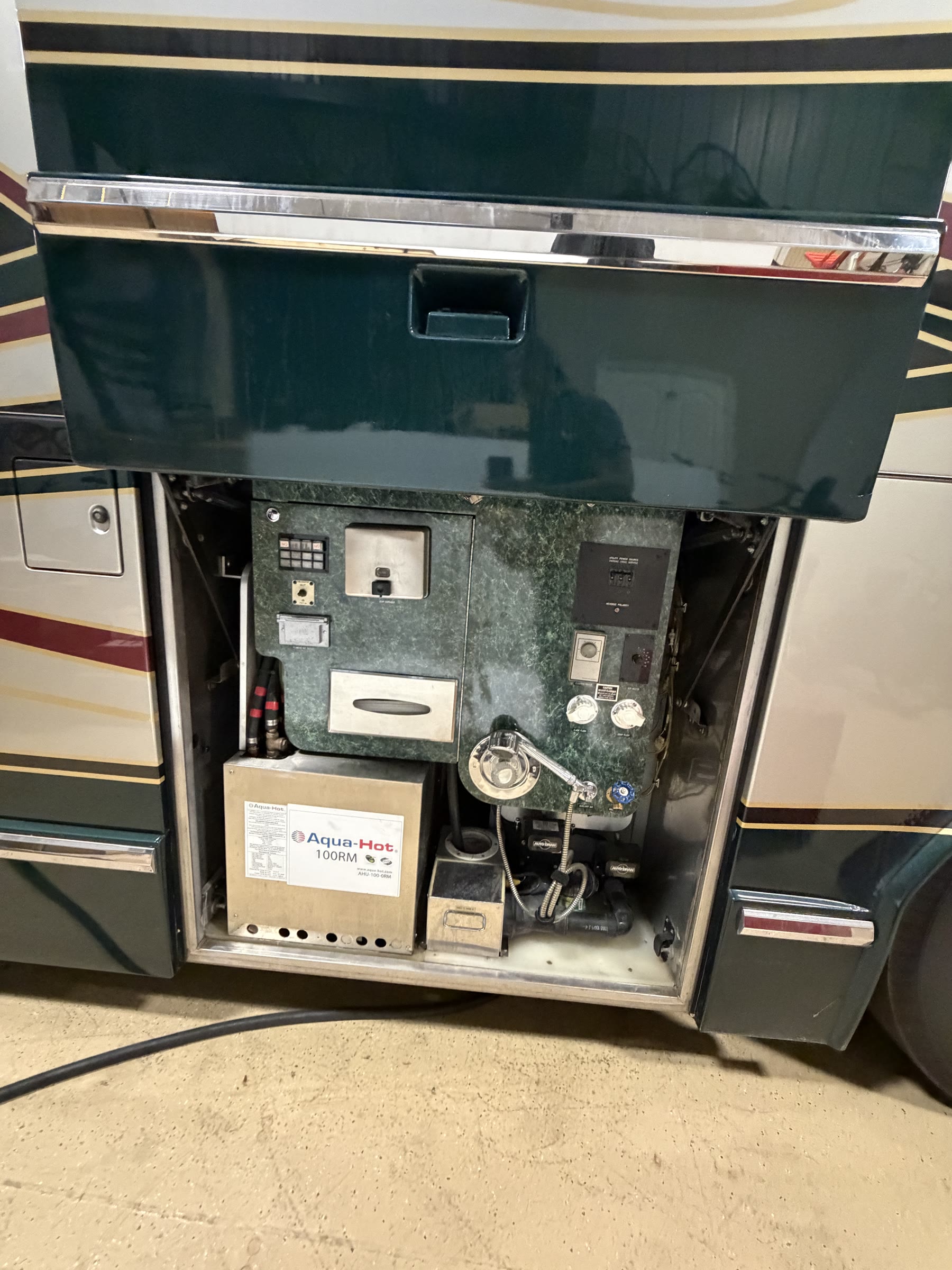 Aqua-Hot 100RM unit and outdoor wash station in the wet bay