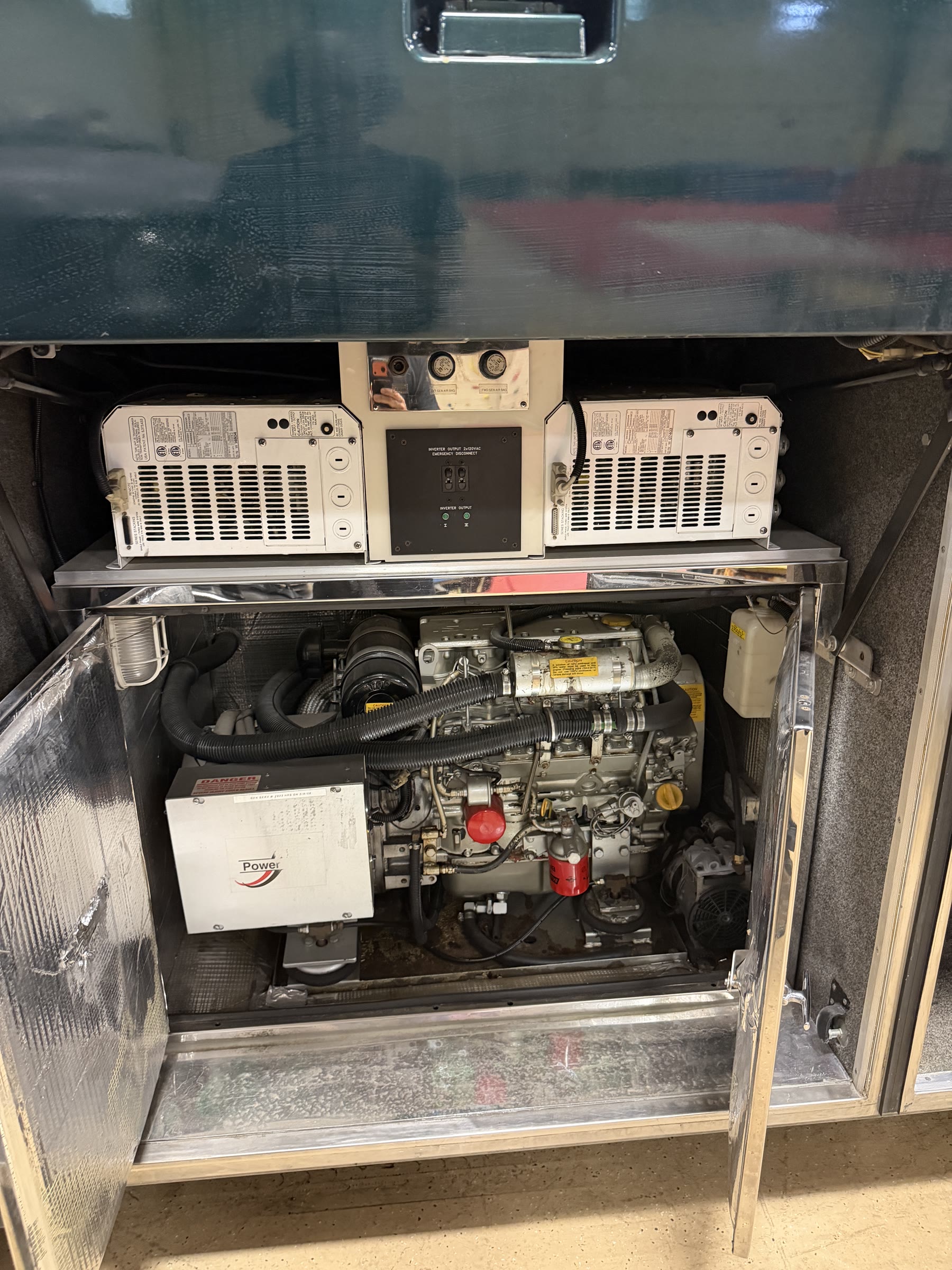 Generator bay with dual inverters mounted above