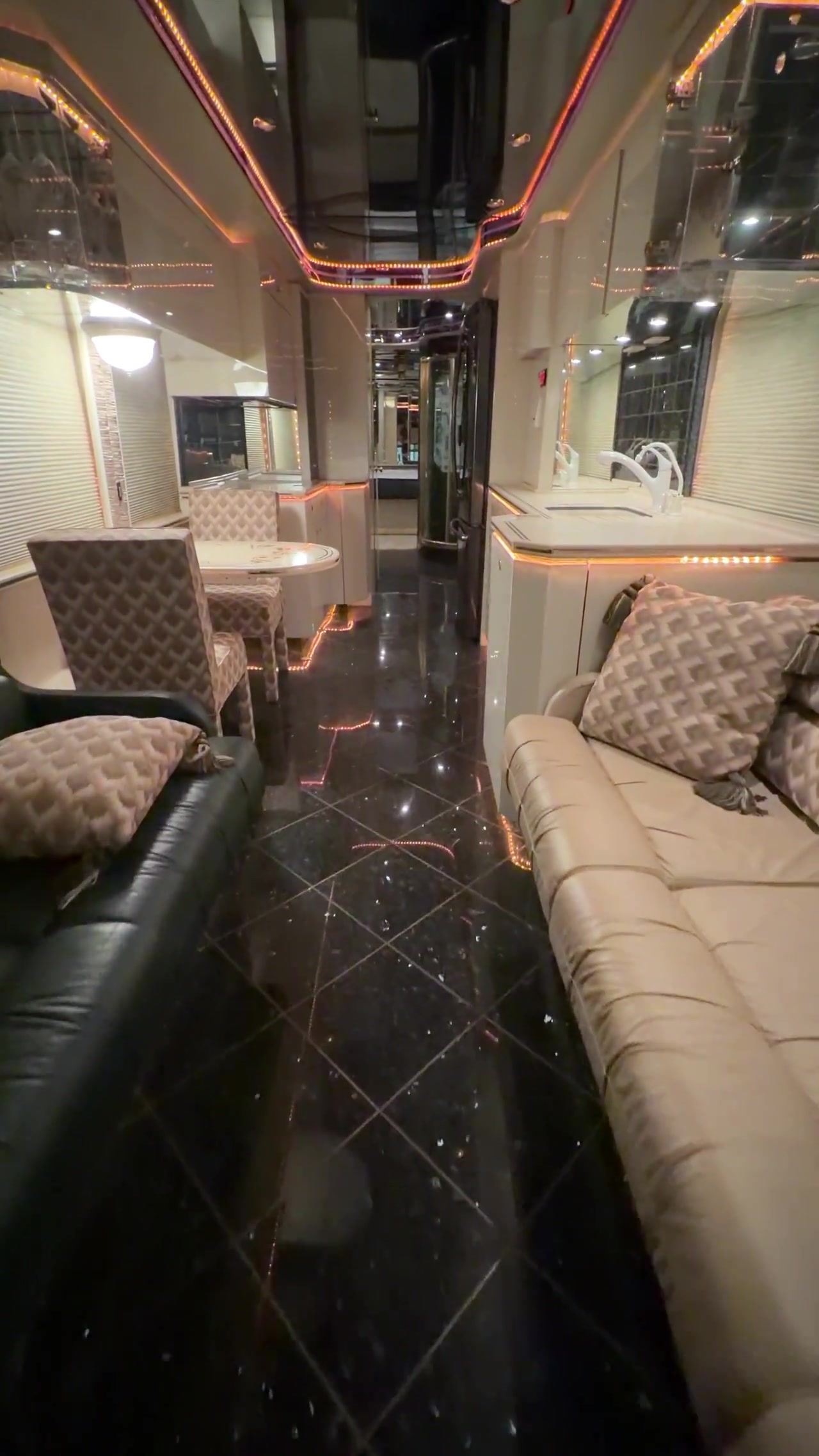 Living area, dining nook, and galley looking aft